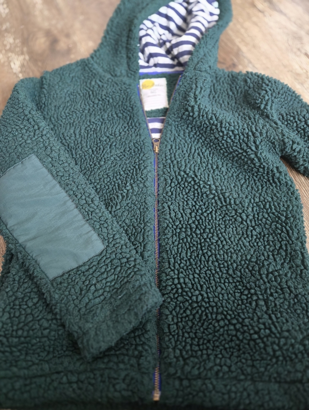 Mini Boden dark green sherpa zip jacket with navy striped lining